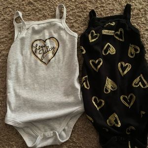 2 Juicy Couture onesies. 12m